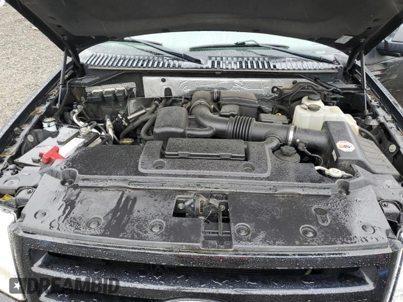 2014 Ford Expedition King Ranch with VIN 1FMJU1J58EEF02298, listed as a Copart auction lot 58672445 with 127,867 mi miles and Salvage title. Bid and sale history available at DreamBid. Image 12.