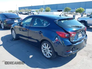 2017 Mazda 3 Touring with VIN 3MZBN1L77HM140562, listed as a IAAI auction lot 42761296 with 76,987 mi miles and . Bid and sale history available at DreamBid. Image 3.