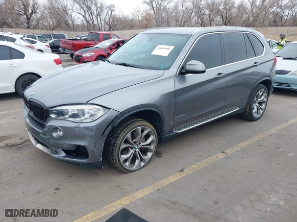 2015 BMW X5 xDrive35d with VIN 5UXKS4C54F0N11025, listed as a IAAI auction lot 41603996 with 138,540 mi miles. Bid and sale history available at carsss.com. Image 2.