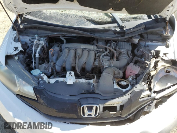 2016 Honda Fit LX z VIN JHMGK5H59GX027526, wystawiony jako Copart lot #57831785 z przebiegiem Nie podano mil oraz Szkoda całkowita • Salvage title. Historia ofert i sprzedaży dostępna na DreamBid. Obrazek 11.