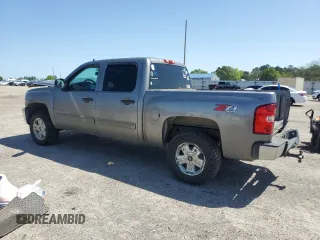 2012 Chevrolet Silverado 1500 LT with VIN 1GCPKSE71CF216239, listed as a Copart auction lot 52108815 with 245,862 mi miles and Salvage Title. Bid and sale history available at DreamBid. Image 2.