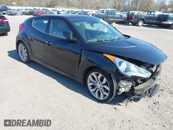 2013 Hyundai Veloster w/Gray Int with VIN KMHTC6AD4DU131242, listed as a IAAI auction lot 42074517 with 76,713 mi miles and . Bid and sale history available at DreamBid. Image 1.