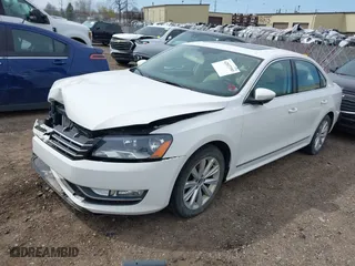 2012 Volkswagen Passat SEL with VIN 1VWCP7A30CC090499, listed as a IAAI auction lot 42037393 with 174,582 mi miles. Bid and sale history available at carsss.com. Image 2.