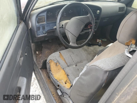 1989 Toyota Pickup DLX z VIN JT4RN93P5K0008068, wystawiony jako Copart lot #58843695 z przebiegiem 285 895 mil mil oraz Czysty tytuł • Clean title. Historia ofert i sprzedaży dostępna na DreamBid. Obrazek 8.