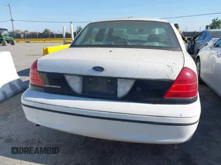 2000 Ford Crown Victoria Police Interceptor z VIN 2FAFP71W7YX104263, wystawiony jako IAAI lot #42442496 z przebiegiem 153 064 mil mil oraz . Historia ofert i sprzedaży dostępna na DreamBid. Obrazek 16.