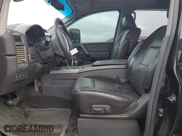 2005 Nissan Titan LE with VIN 1N6AA07B15N552302, listed as a Copart auction lot 44396985 with 172,401 mi miles and Salvage Title. Bid and sale history available at carsss.com. Image 7.