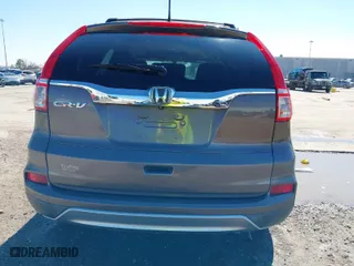 2015 Honda CR-V EX-L with VIN 2HKRM3H7XFH519437, listed as a IAAI auction lot 41656984 with 143,107 mi miles. Bid and sale history available at carsss.com. Image 16.