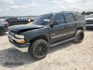 2002 Chevrolet Tahoe LS z VIN 1GNEC13T82R237754, wystawiony jako Copart lot #57469505 z przebiegiem 184 064 mil mil oraz Szkoda całkowita • Salvage title. Historia ofert i sprzedaży dostępna na DreamBid. Obrazek 1.