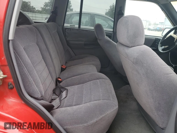 1996 Jeep Grand Cherokee Laredo with VIN 1J4GZ58S7TC292217, listed as a Copart auction lot 80757904 with 156,041 mi miles and Salvage Title. Bid and sale history available at carsss.com. Image 11.