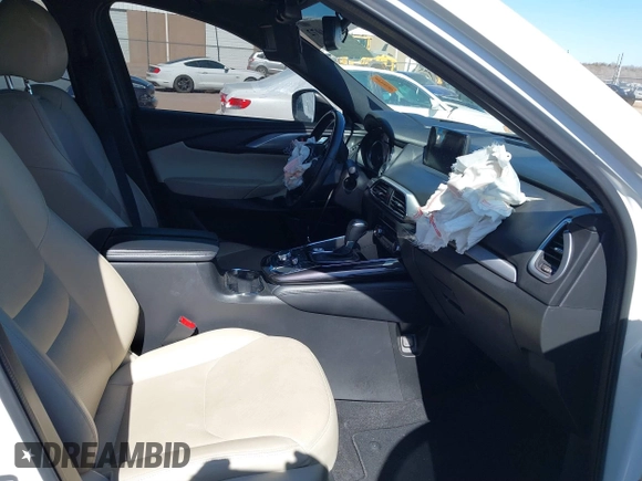 2018 Mazda CX-9 Grand Touring with VIN JM3TCADY6J0229768, listed as a IAAI auction lot 41724072 with 80,918 mi miles and . Bid and sale history available at DreamBid. Image 5.