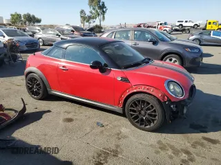 2012 MINI Cooper Coupe with VIN WMWSX1C5XCT163790, listed as a Copart auction lot 73148734 with 144,323 mi miles and Salvage Title. Bid and sale history available at carsss.com. Image 4.