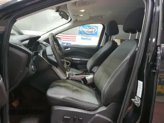 2016 Ford Escape SE with VIN 1FMCU9GX5GUB67512, listed as a Copart auction lot 53002675 with 141,033 mi miles and Salvage Title. Bid and sale history available at carsss.com. Image 7.