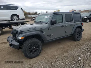 2022 Jeep Wrangler Unlimited Willys with VIN 1C4HJXDN7NW156538, listed as a Copart auction lot 79195464 with 87,081 mi miles and Salvage Title. Bid and sale history available at DreamBid. Image 1.