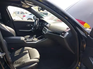 2019 BMW 3 Series 330i with VIN WBA5R1C50KAJ98579, listed as a IAAI auction lot 42359728 with 41,173 mi miles and . Bid and sale history available at DreamBid. Image 5.