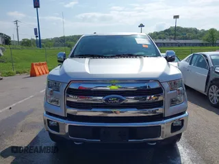 2015 Ford F-150 XLT with VIN 1FTEW1EG8FKE61864, listed as a IAAI auction lot 42120436 with 129,448 mi miles and . Bid and sale history available at DreamBid. Image 13.