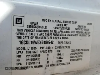 1999 Chevrolet Astro z VIN 1GCDL19W6XB189242, wystawiony jako Copart lot #56042595 z przebiegiem 196 608 mil mil oraz Szkoda całkowita • Salvage title. Historia ofert i sprzedaży dostępna na DreamBid. Obrazek 13.