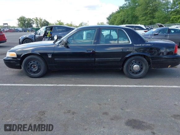 2011 Ford Police Interceptor with VIN 2FABP7BV9BX141326, listed as a IAAI auction lot 42818928 with 110,734 mi miles and . Bid and sale history available at DreamBid. Image 12.