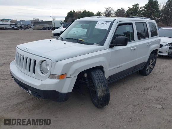 2016 Jeep Patriot Latitude with VIN 1C4NJRFBXGD627551, listed as a IAAI auction lot 41716065 with 140,000 mi miles. Bid and sale history available at carsss.com. Image 2.
