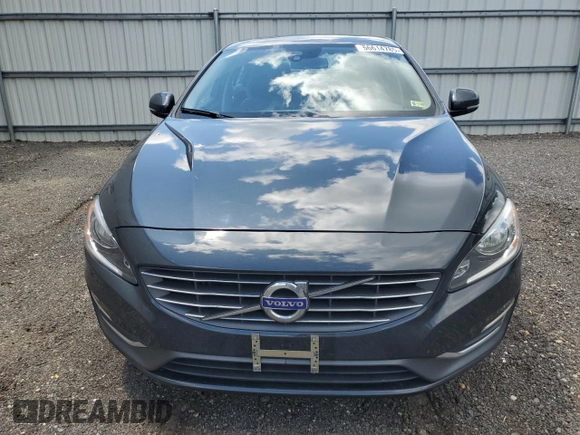 2014 Volvo S60 T5 z VIN YV1612FS6E1287285, wystawiony jako Copart lot #56614785 z przebiegiem 104 637 mil mil oraz Szkody całkowita. Historia ofert i sprzedaży dostępna na DreamBid. Obrazek 5.
