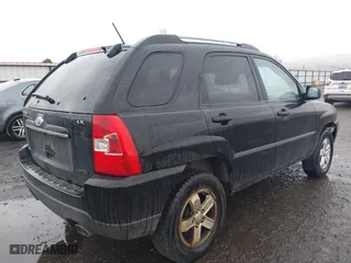 2009 Kia Sportage LX with VIN KNDJE723497612745, listed as a IAAI auction lot 41974301 with 141,110 mi miles. Bid and sale history available at carsss.com. Image 4.