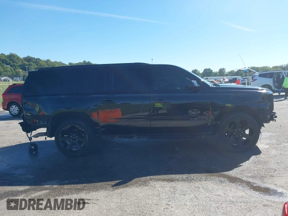2019 Chevrolet Suburban Premier with VIN 1GNSKJKJ1KR100936, listed as a IAAI auction lot 40489121 with 97,884 mi miles and . Bid and sale history available at DreamBid. Image 14.