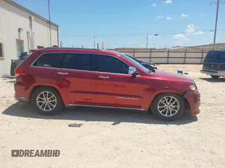 2014 Jeep Grand Cherokee Summit with VIN 1C4RJFJT1EC237358, listed as a IAAI auction lot 42602245 with 106,821 mi miles and . Bid and sale history available at DreamBid. Image 13.