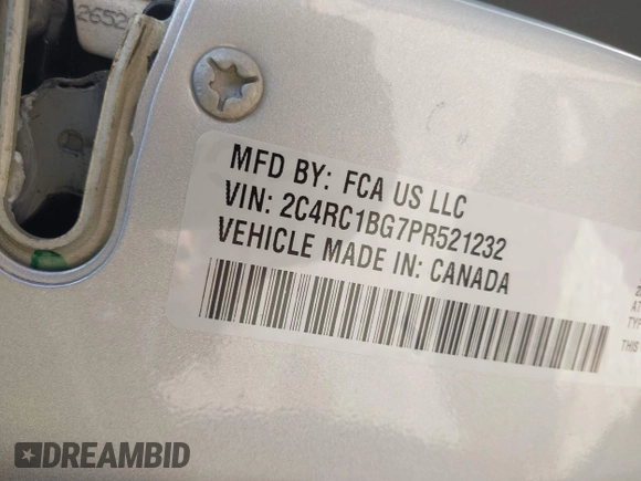 2023 Chrysler Pacifica Touring L with VIN 2C4RC1BG7PR521232, listed as a IAAI auction lot 42087909 with 34,609 mi miles and . Bid and sale history available at DreamBid. Image 9.