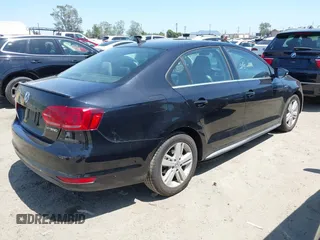 2013 Volkswagen Jetta Hybrid SE with VIN 3VW637AJ8DM299657, listed as a IAAI auction lot 42538101 with 128,822 mi miles and . Bid and sale history available at DreamBid. Image 4.