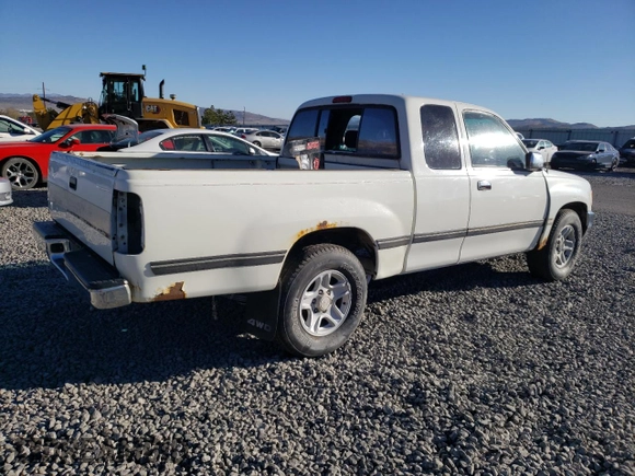 1995 Toyota T100 SR5 with VIN JT4VD12F1S0004904, listed as a Copart auction lot 75796804 with 182,011 mi miles and Salvage Title. Bid and sale history available at DreamBid. Image 3.