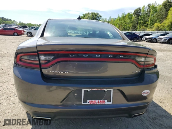 2015 Dodge Charger SXT with VIN 2C3CDXHG8FH794623, listed as a Copart auction lot 52000144 with 145,624 mi miles and Salvage Title. Bid and sale history available at DreamBid. Image 6.