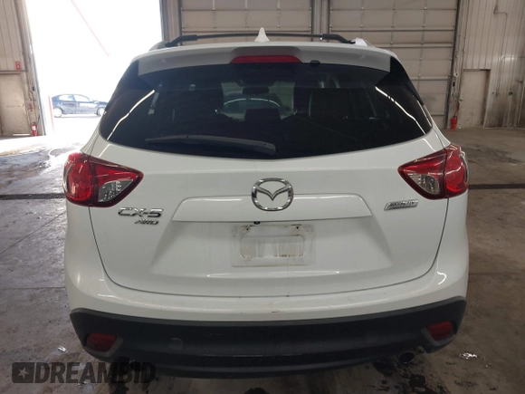 2014 Mazda CX-5 Touring with VIN JM3KE4CY4E0321055, listed as a IAAI auction lot 41613593 with 174,339 mi miles. Bid and sale history available at carsss.com. Image 17.