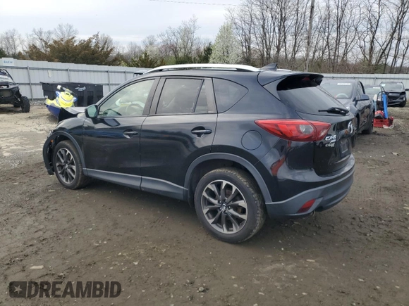 2016 Mazda CX-5 Grand Touring with VIN JM3KE4DY0G0727366, listed as a Copart auction lot 51682115 with 114,462 mi miles and Salvage Title. Bid and sale history available at carsss.com. Image 2.