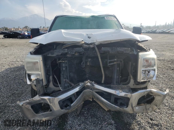2015 Ford F-250 XLT with VIN 1FT7X2A65FEA41700, listed as a Copart auction lot 42645615 with 172,430 mi miles and Salvage title. Bid and sale history available at DreamBid. Image 5.
