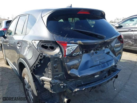2016 Mazda CX-5 Touring with VIN JM3KE2CY8G0874248, listed as a IAAI auction lot 41679166 with NaN miles. Bid and sale history available at carsss.com. Image 6.