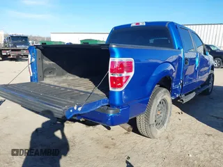2014 Ford F-150 XL with VIN 1FTFW1CF6EKD90807, listed as a IAAI auction lot 41466067 with 127,686 mi miles. Bid and sale history available at carsss.com. Image 4.