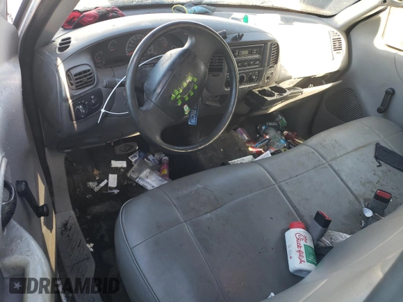 1999 Ford F-150 with VIN 1FTRF17W9XKB35000, listed as a Copart auction lot 86001964 with 155,055 mi miles and Salvage title. Bid and sale history available at DreamBid. Image 8.