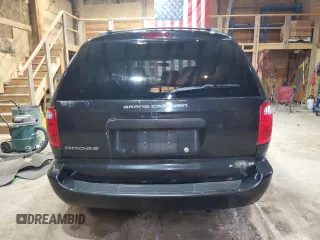 2005 Dodge Caravan SE z VIN 1D4GP24R45B245977, wystawiony jako Copart lot #58262555 z przebiegiem 254 176 mil mil oraz Czysty tytuł • Clean title. Historia ofert i sprzedaży dostępna na DreamBid. Obrazek 6.