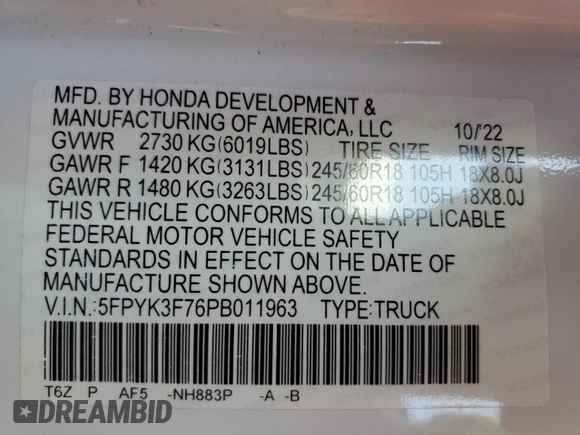 2023 Honda Ridgeline RTL-E with VIN 5FPYK3F76PB011963, listed as a Copart auction lot 63079165 with 25,658 mi miles and Salvage title. Bid and sale history available at DreamBid. Image 12.