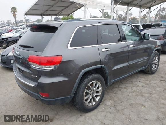 2014 Jeep Grand Cherokee Limited with VIN 1C4RJEBG0EC555774, listed as a IAAI auction lot 42160952 with 102,076 mi miles and . Bid and sale history available at DreamBid. Image 4.
