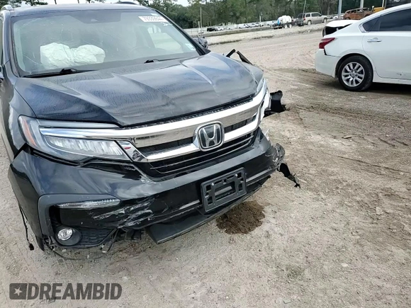 2021 Honda Pilot Touring 8-Passenger with VIN 5FNYF5H96MB000075, listed as a Copart auction lot 79339844 with 53,078 mi miles and Salvage Title. Bid and sale history available at DreamBid. Image 11.