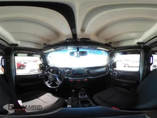 2018 Jeep Wrangler Unlimited Sahara with VIN 1C4HJXEG4JW115522, listed as a IAAI auction lot 42322791 with 68,409 mi miles and . Bid and sale history available at DreamBid. Image 18.