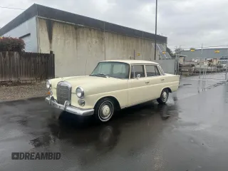 1967 Mercedes-Benz E with VIN 11001010184461, listed as a Copart auction lot 83359704 with 78,345 mi miles and Clean Title. Bid and sale history available at DreamBid. Image 2.