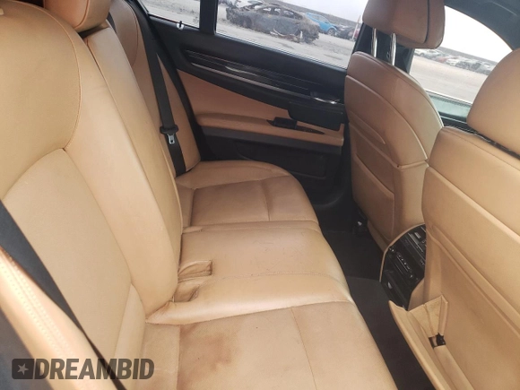 2011 BMW 7 Series 750i with VIN WBAKA8C5XBCY37073, listed as a Copart auction lot 76238914 with 129,493 mi miles and Clean title. Bid and sale history available at DreamBid. Image 10.