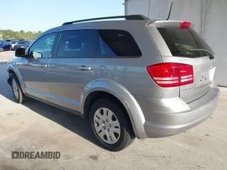 2020 Dodge Journey SE Value with VIN 3C4PDCAB7LT261203, listed as a IAAI auction lot 41963451 with 69,612 mi miles and . Bid and sale history available at carsss.com. Image 3.