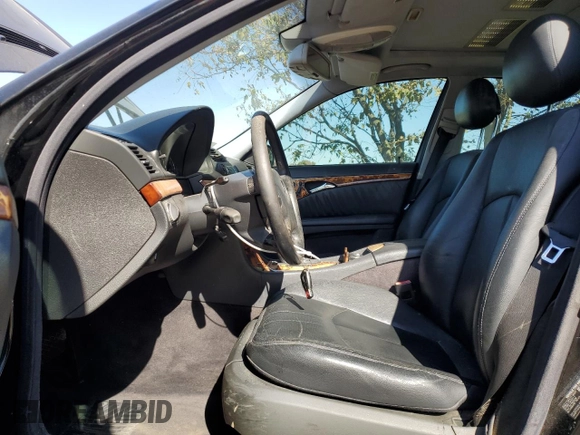 2003 Mercedes-Benz E-Class 3.2L with VIN WDBUF65J03A281430, listed as a Copart auction lot 77086054 with 121,080 mi miles and Salvage Title. Bid and sale history available at carsss.com. Image 7.