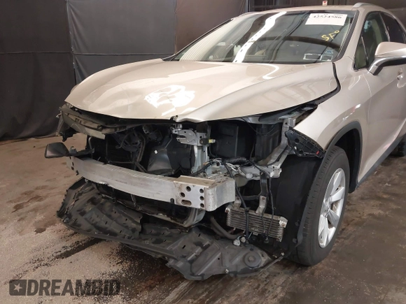 2017 Lexus RX 350 z VIN 2T2BZMCAXHC064652, wystawiony jako IAAI lot #42524586 z przebiegiem 70 702 mil mil oraz . Historia ofert i sprzedaży dostępna na DreamBid. Obrazek 6.