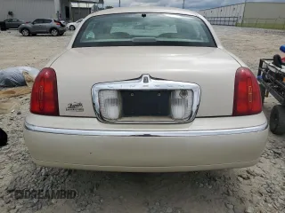 2001 Lincoln Town Car Cartier L z VIN 1LNHM85W61Y640344, wystawiony jako Copart lot #74755564 z przebiegiem Nie podano mil oraz Szkoda całkowita • Salvage title. Historia ofert i sprzedaży dostępna na DreamBid. Obrazek 6.