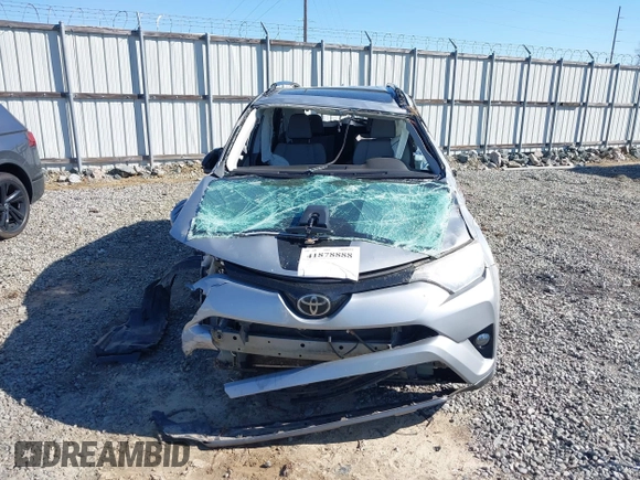 2018 Toyota RAV4 XLE with VIN 2T3RFREVXJW748993, listed as a IAAI auction lot 41878888 with 111,760 mi miles and . Bid and sale history available at DreamBid. Image 12.