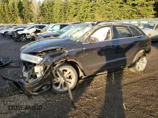 2015 Audi Q3 2.0T Prestige with VIN WA1GFCFS8FR007672, listed as a Copart auction lot 83324044 with 0 mi miles and Salvage Title. Bid and sale history available at carsss.com. Image 1.