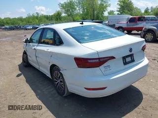 2021 Volkswagen Jetta S with VIN 3VWC57BU3MM079977, listed as a IAAI auction lot 42274063 with 36,052 mi miles and . Bid and sale history available at DreamBid. Image 3.